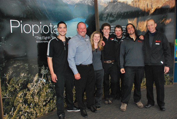 Southern Discoveries staff celebrate the official launch of the Milford Discovery Centre.  From L to R:  Semisi Miller,  John Robson, Anita Golden, Sam Hansen, Jono Burns, Ricardo Gonzalez, Ross MacDonald